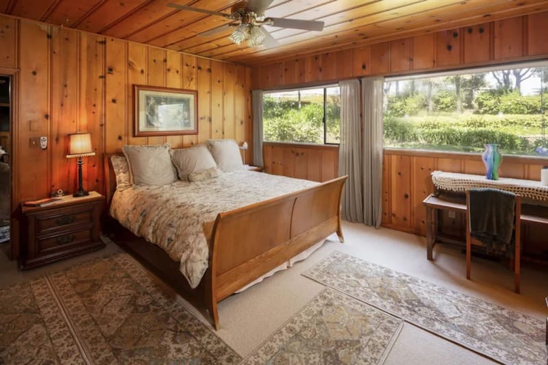 One of the four bedrooms in the main house